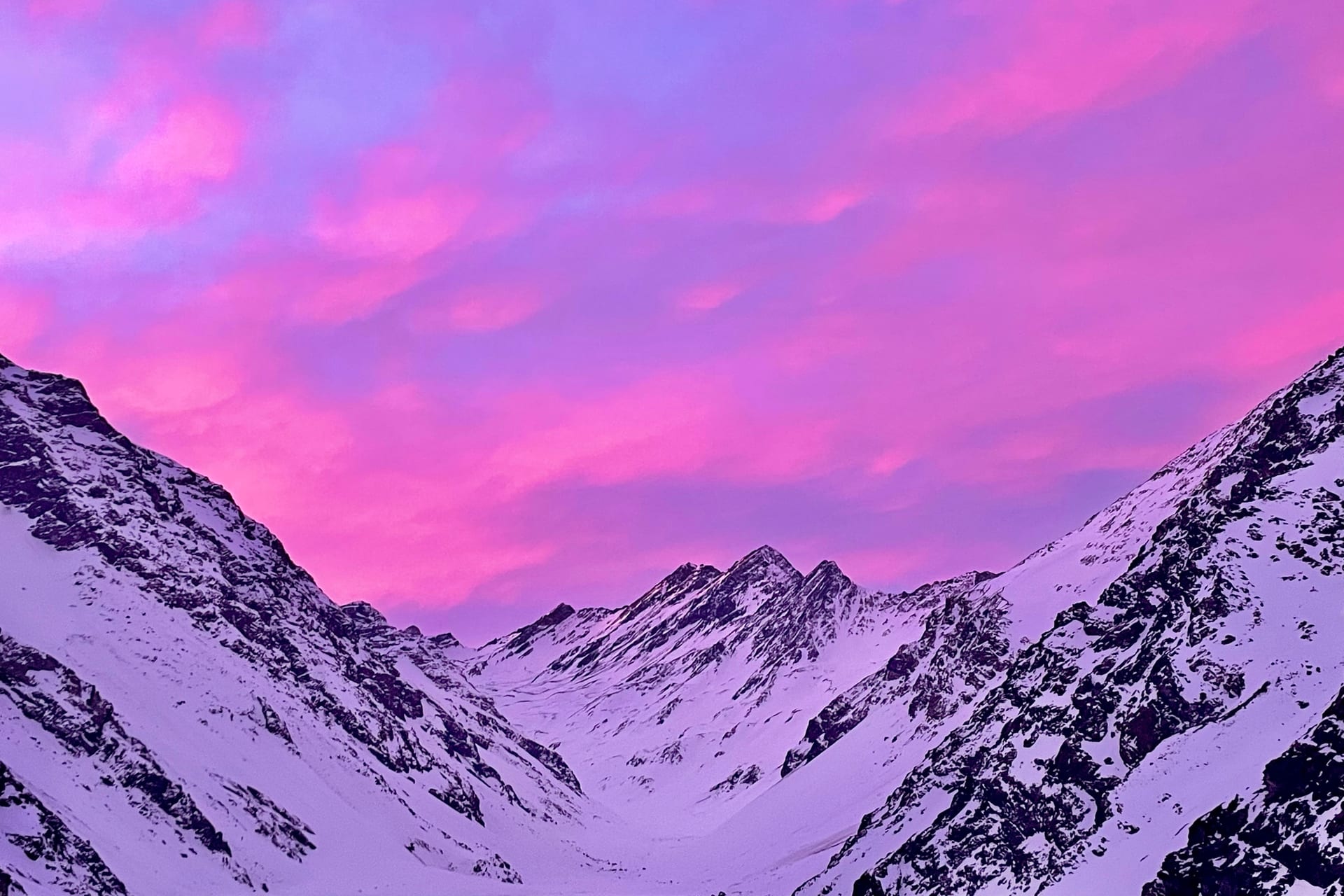 Sunset over Laguna del Inca, wedged between rock walls at Portillo.