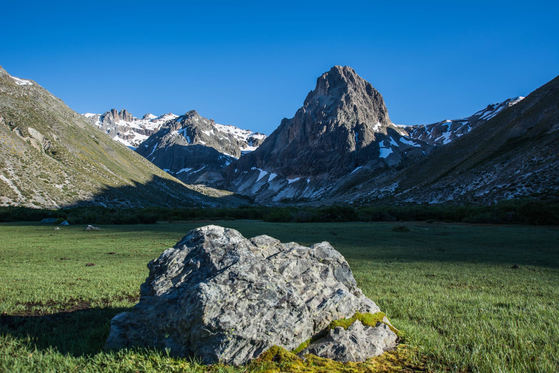 The Colmillo del Diablo rock formation above the El Bolsón valley, in Radal Siete Tazas National Park.
